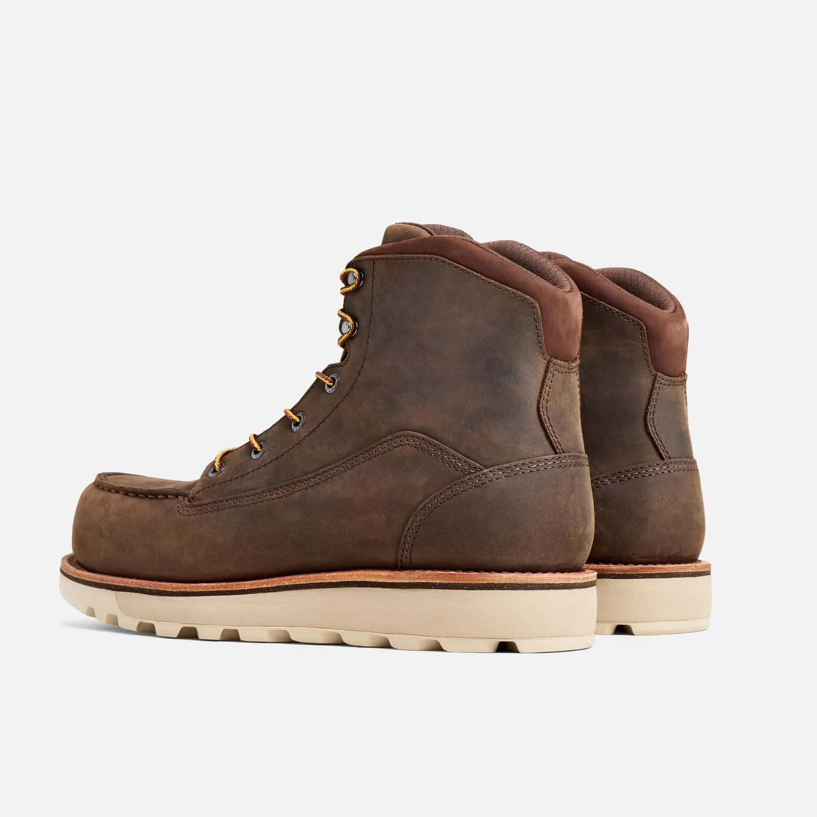 Three-quarter view of a pair of Anzhou 301 brown leather waterproof safety boots showing moc toe and side profile