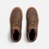Top-down view of a pair of Anzhou 301 brown leather waterproof safety boots with moc toe stitching and two-tone laces