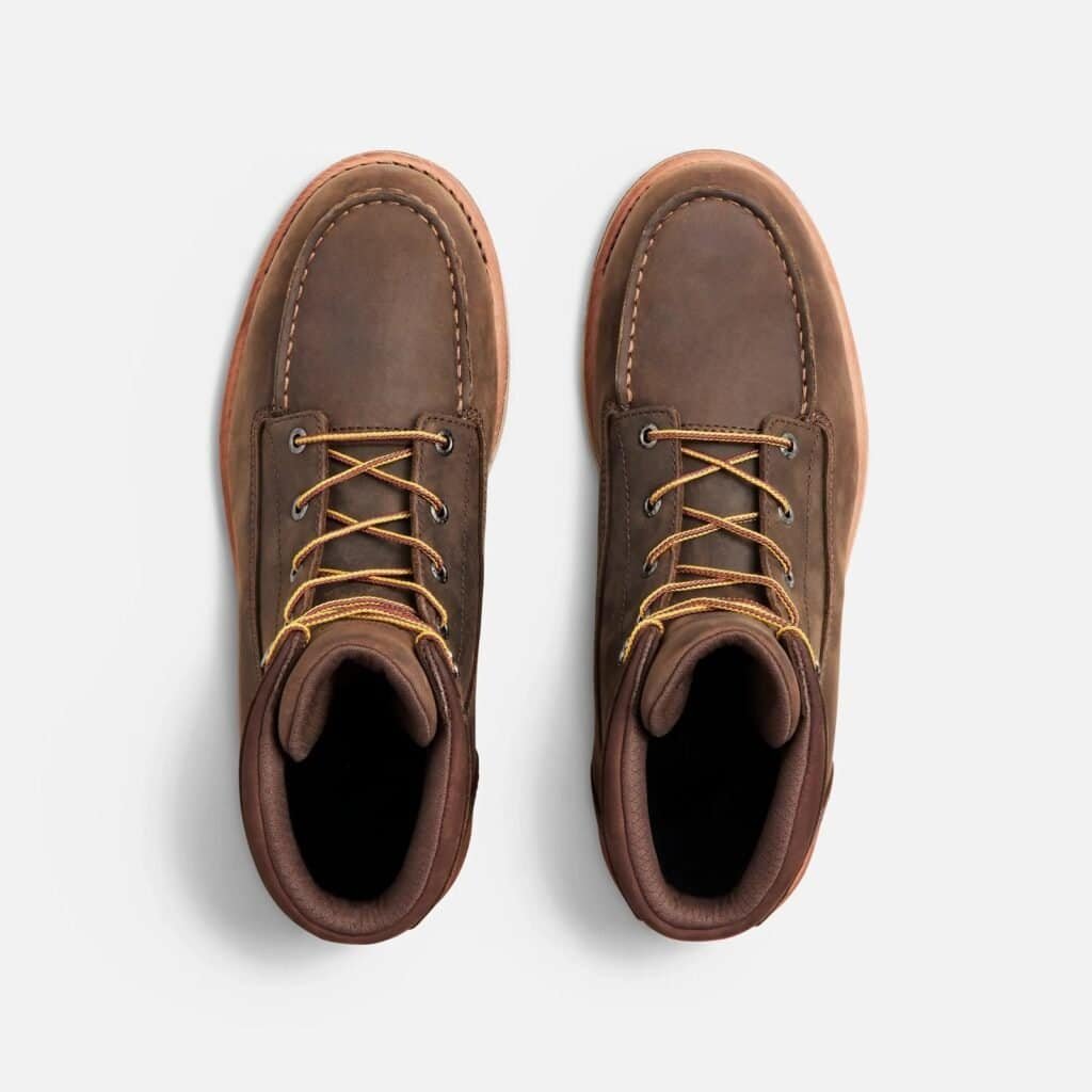 Top-down view of a pair of Anzhou 301 brown leather waterproof safety boots with moc toe stitching and two-tone laces